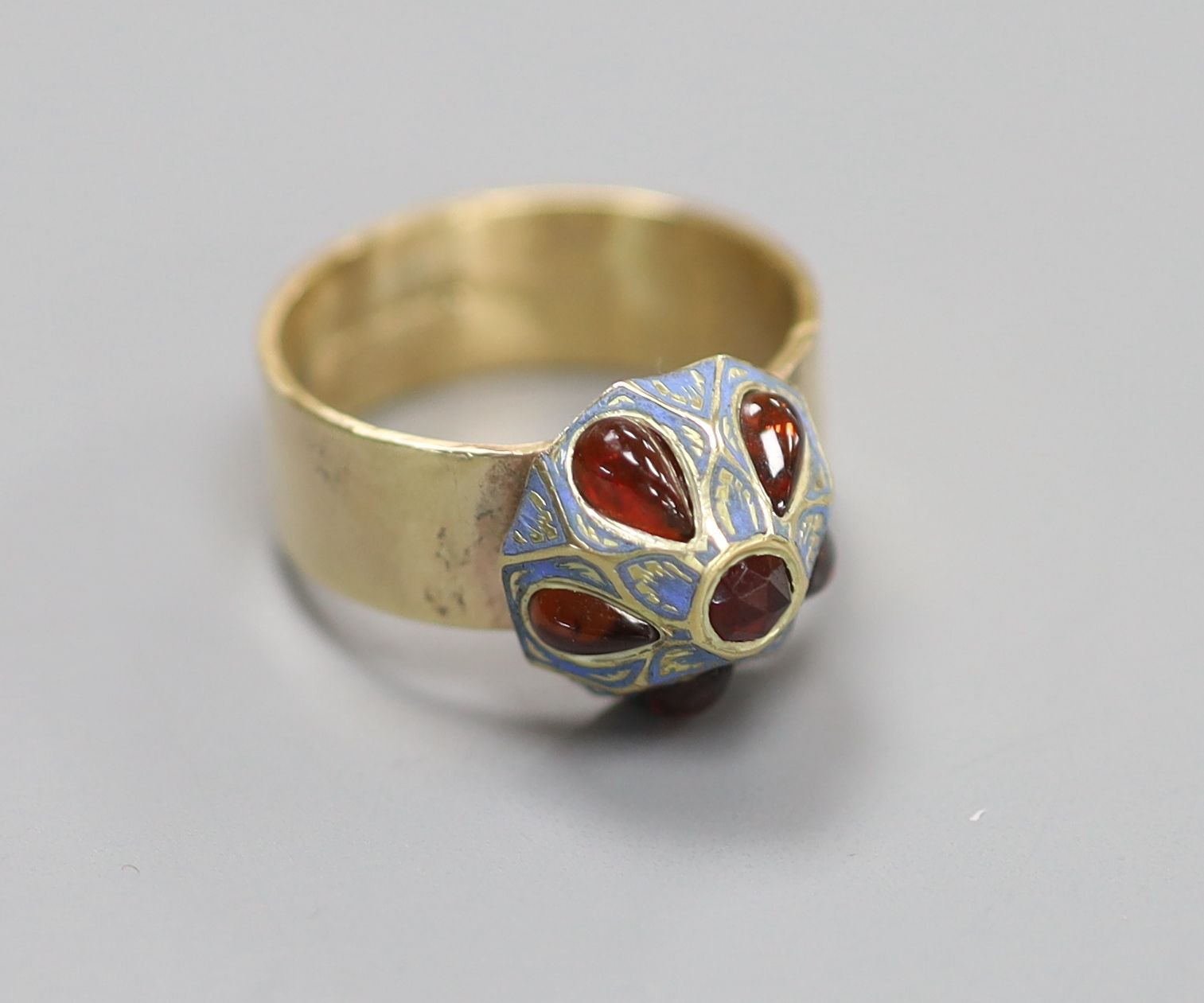 A modern 9ct gold, six stone garnet and enamel set domed top 'button' dress ring (adapted)